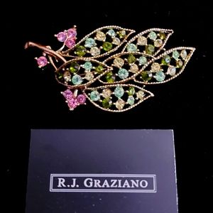 R J Graziano leaves brooch
